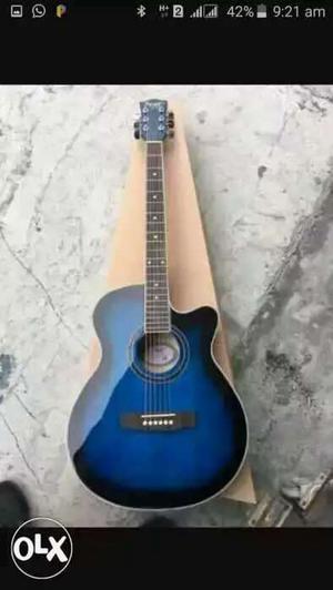 Blue Cutaway Acoustic Guitar Screenshot