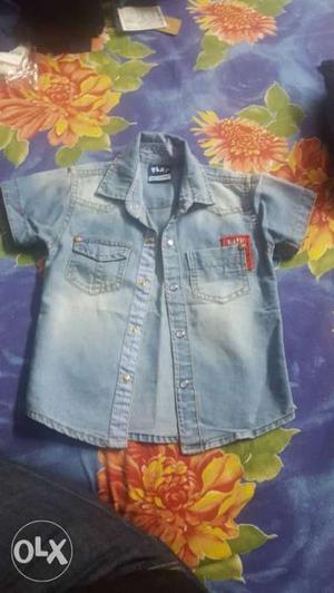 Denim shirt excellent condition. For 2 year old