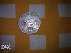 Hexagonal  Silver-colored 20 Indian Paise Coin