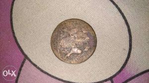 It's an Indian coin of  It has some word in