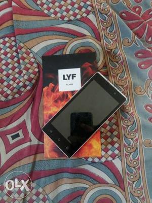 Lyf flam box charger handsfree good condition