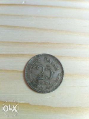Old 25 paisa coin of year 
