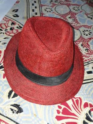 Red hat with black stripes