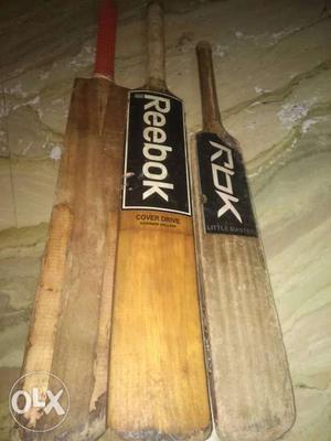 Three Brown Cricket Bats