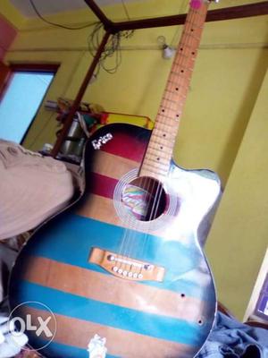 Acoustic Guitar with bag belt and pick