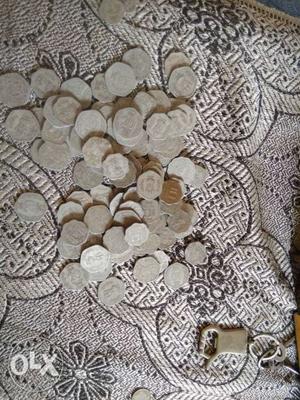 Around 85old coins ranging from