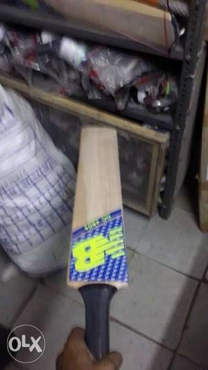 Beige And Blue New Balance Cricket Bat