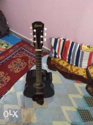 Black And Brown Acoustic Guitar