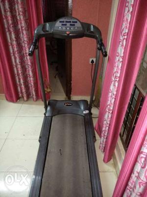Black And Red Automatic Treadmill