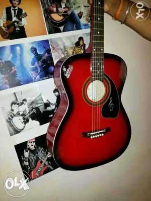 Black And Red Burst Acoustic Guitar