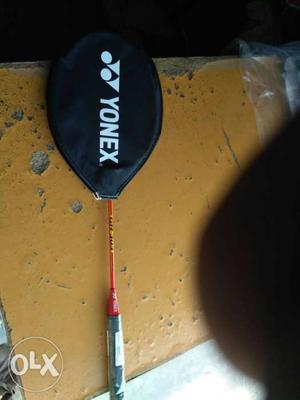 Black And Red Yonex Badminton Racket With Black Leather Case