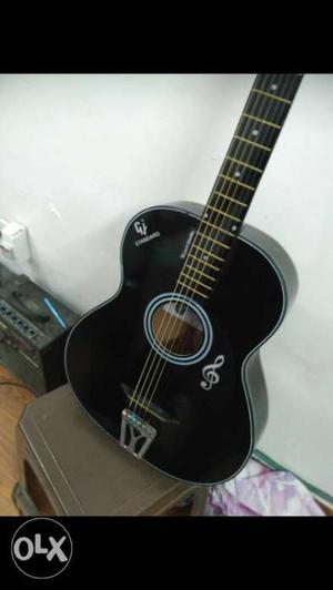 Black hollow pure acoustic guitar, very good