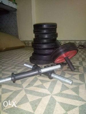Brand new dumbbells 20kg and pro abs roller in excellent