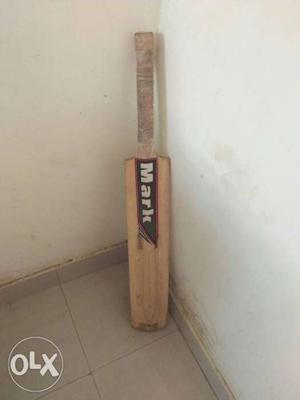 Brown And Black Mark Cricket Bat