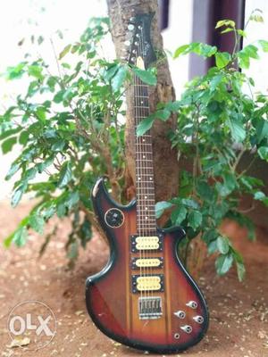 Brown And Black Stratocaster Guitar