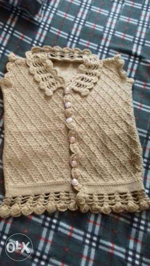 Brown And White Knitted Textile