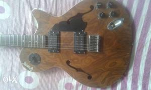 Brown Gibson Semi Hallow Guitar