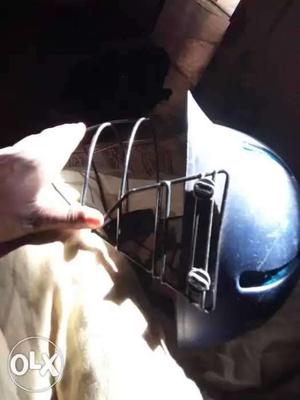 Cricket helmet in good condition and fit for play