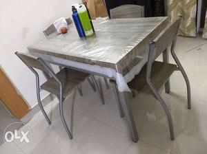 Dining table with 4 chairs in good condition for