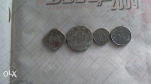 Four 5, 10, And 25 Indian Coins