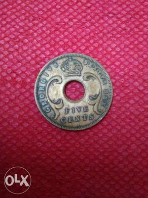 Gold-colored Pice Coin