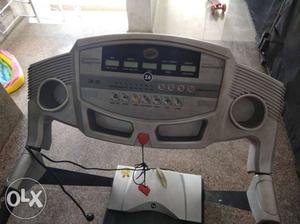Gray And Black Automatic Treadmill