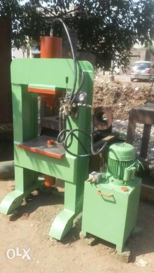 Green And Orange Hydraulic Machine