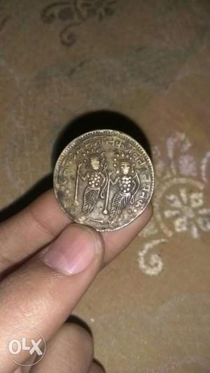 It is so old coin. Something is written on it and