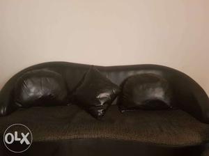 Light weight leather 5 seater sofa. black in color. easily