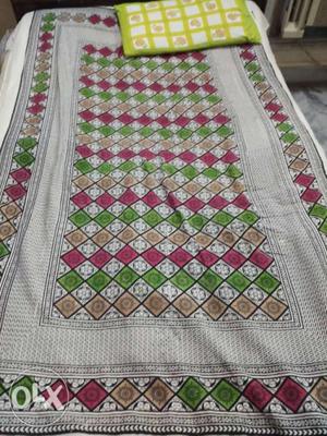 Pink, Green, And White Floral bed sheet
