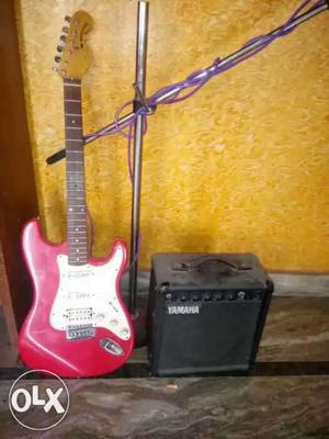 Red Stratocaster-style Electric Guitar With Black Yamaha