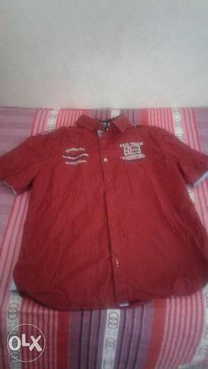 Red colour half sleeves shirt at discont prize