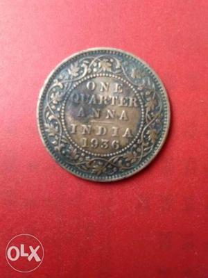 Round  Copper-colored 1 Quarter Indian Anna Coin