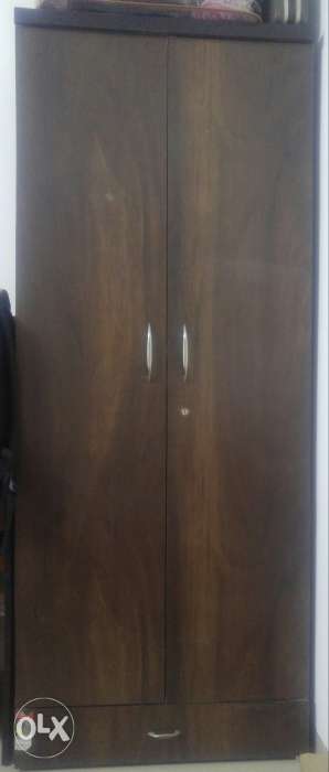 Stylish brown wooden wardrobe