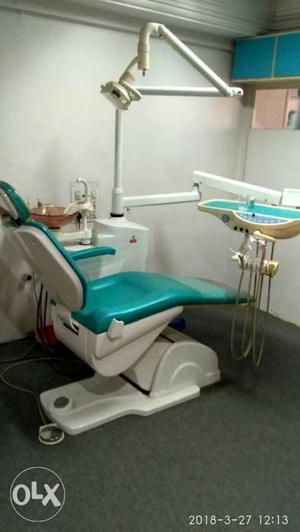 Teal And White Dentist's Medical Chair