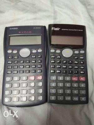 Two Black Texas Instruments TI-83 Plus