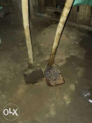 Two Brown Handled Shovels