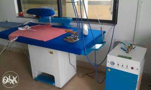 Vacuum ironing table for dry cleaners