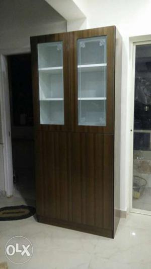 Veneer crockery unit made of natural green ply with melamine