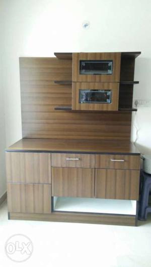 Veneer dining cupboard made of natural green ply with