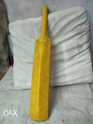 Yellow Wooden Paddle