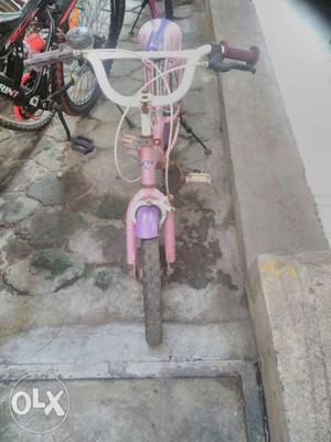 18" cycle suitable for 4 to 8 year old.