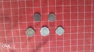 3 Silver-colored Coins and 2 twenty five paise for sale