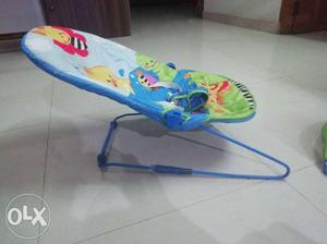 Baby's White And Blue Fisher-Price Bouncer Seat