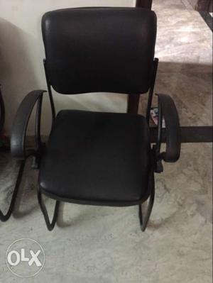 Black leather chair...2 available at /-