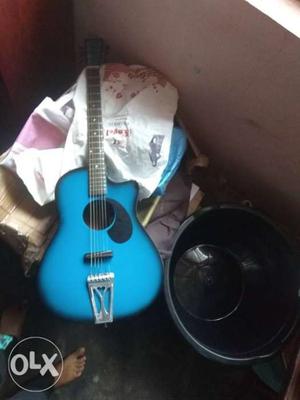 Blue Burst And Black Acoustic Guitar