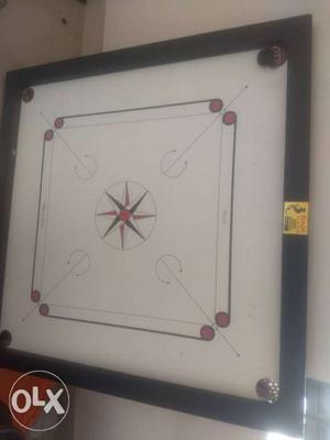 Brown And Black Wooden Carrom Board