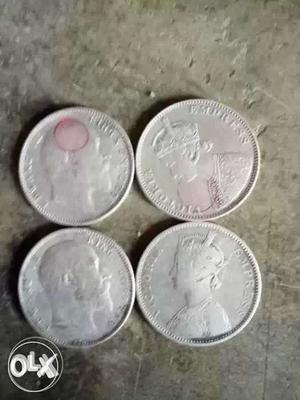 Four Silver-colored Coins