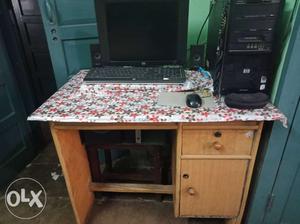 HP desktop PC with Brown Wooden Desk