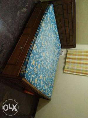 King size teak wood bed with storage and Sleepwell Mattress.